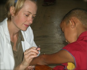 Jennie Treating Monk with Moxa
